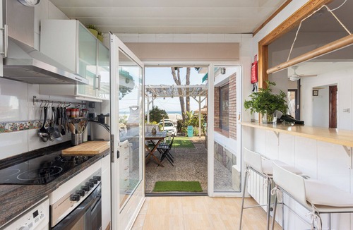 Premia de Dalt House | House with a view of the ocean, a garden, and a pool