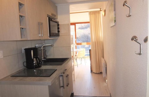 Le Corbier Apartment | Studio Soyouz Vanguard-47 by Interhome