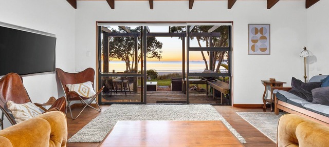 Beachfront Bliss, Parapara. Stunning beachfront home. Family and pet friendly. in Parapara