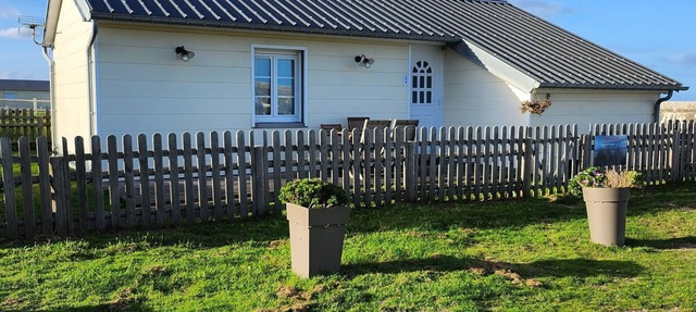 Beachfront house. in Quinéville