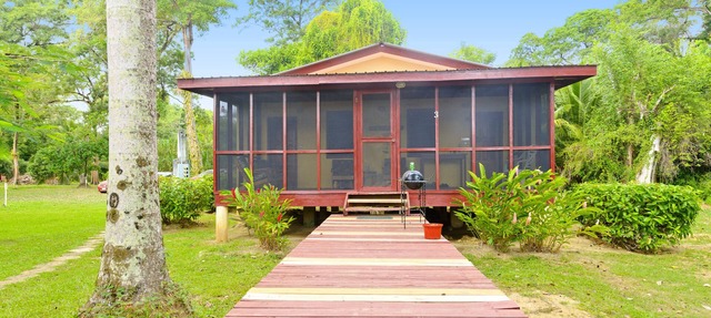 Beautiful cabin nestled in tropical surroundings on the Banks of the Sitee River in Hopkins