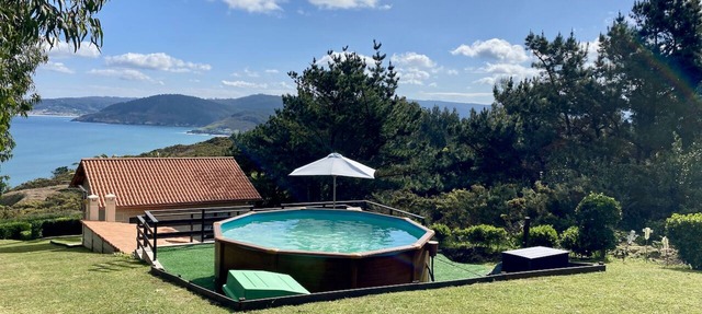 Cozy, private oceanfront cottage with pool just steps to the beach! in Cariño