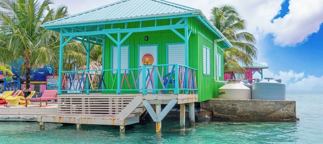 Green Parrotfish Overwater Cabana with Sunset Views Belize in Placencia