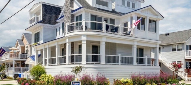 New construction, single-family home boasts 5 bedrooms and 5.2 baths, offering luxury and comfort in Avalon