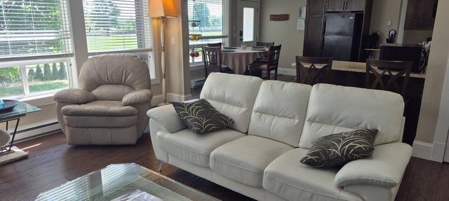 Scenic 2 bdrm walkout suite with shared hot-tub, outdoor pool, and view of park. in Abbotsford