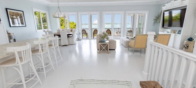 Serene waterfront house w pool, dock & beautiful sunsets - 5 min walk to beach. in Dunmore Town