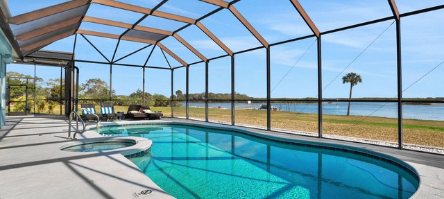 Sprawling intercoastal home with boat lifts, pool and hot tub in Edgewater