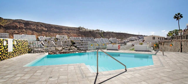 Vacation Apartment 'Bungalow Eden' with Shared Pool, Wi-Fi, and Air Conditioning in Puerto Rico